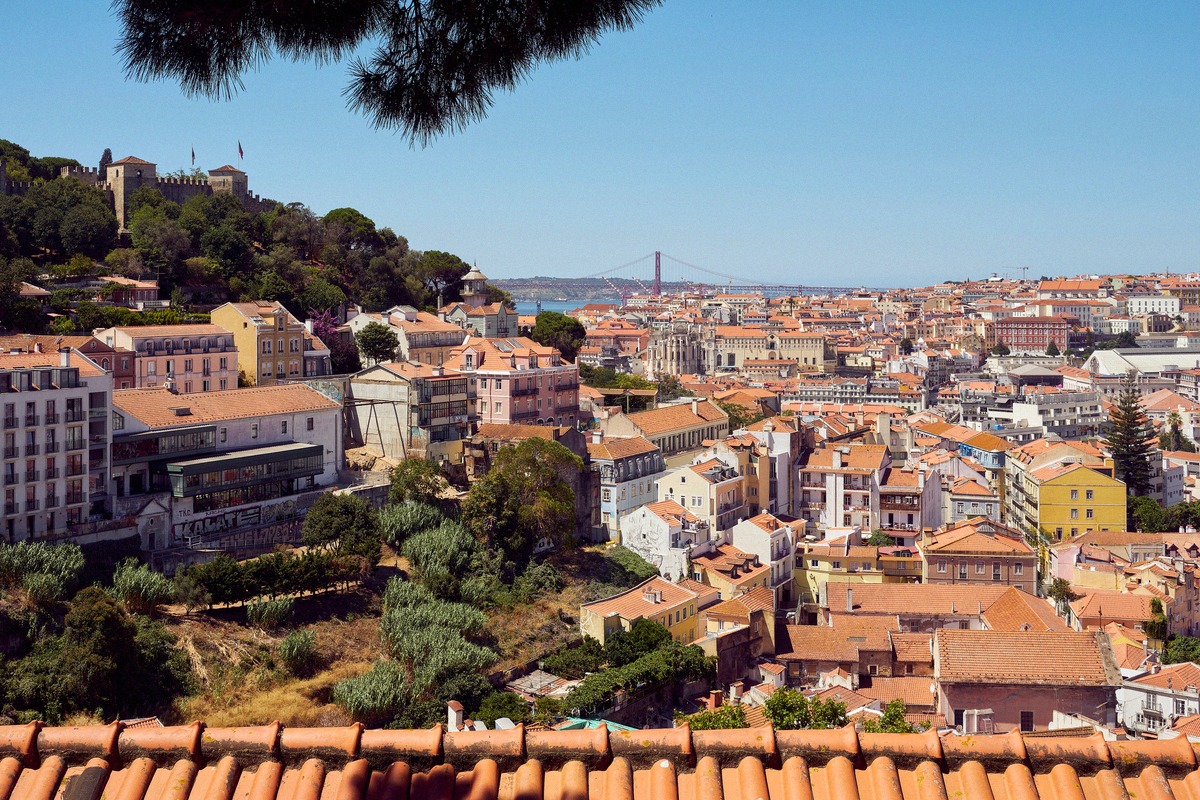 View from the Miradouro da Graça across the rooftops to the Ponte 25 de Abril